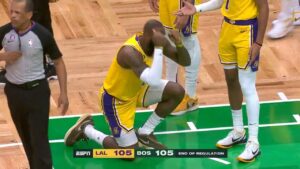 Magic Johnson reacts to referees missing foul on LeBron James