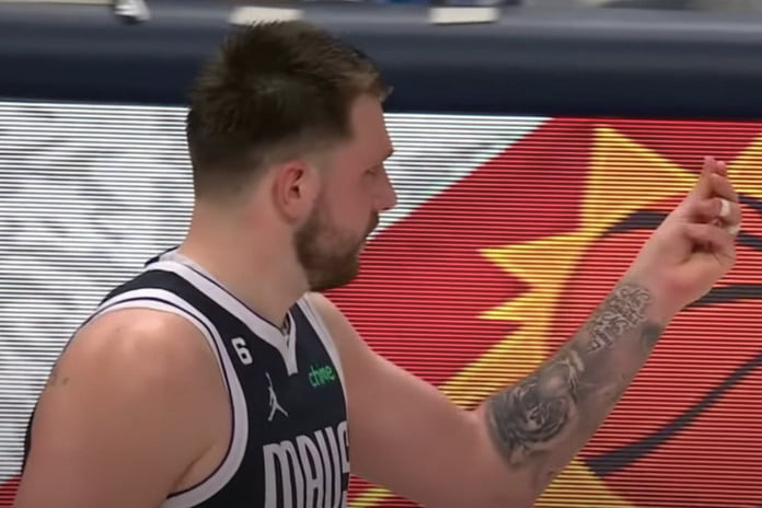 Luka Doncic shows “money” gesture after refs don’t call foul against him