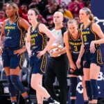 Caitlin Clark reacts to the first WNBA win